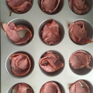 Place turkey bacon in your cupcake pan.
